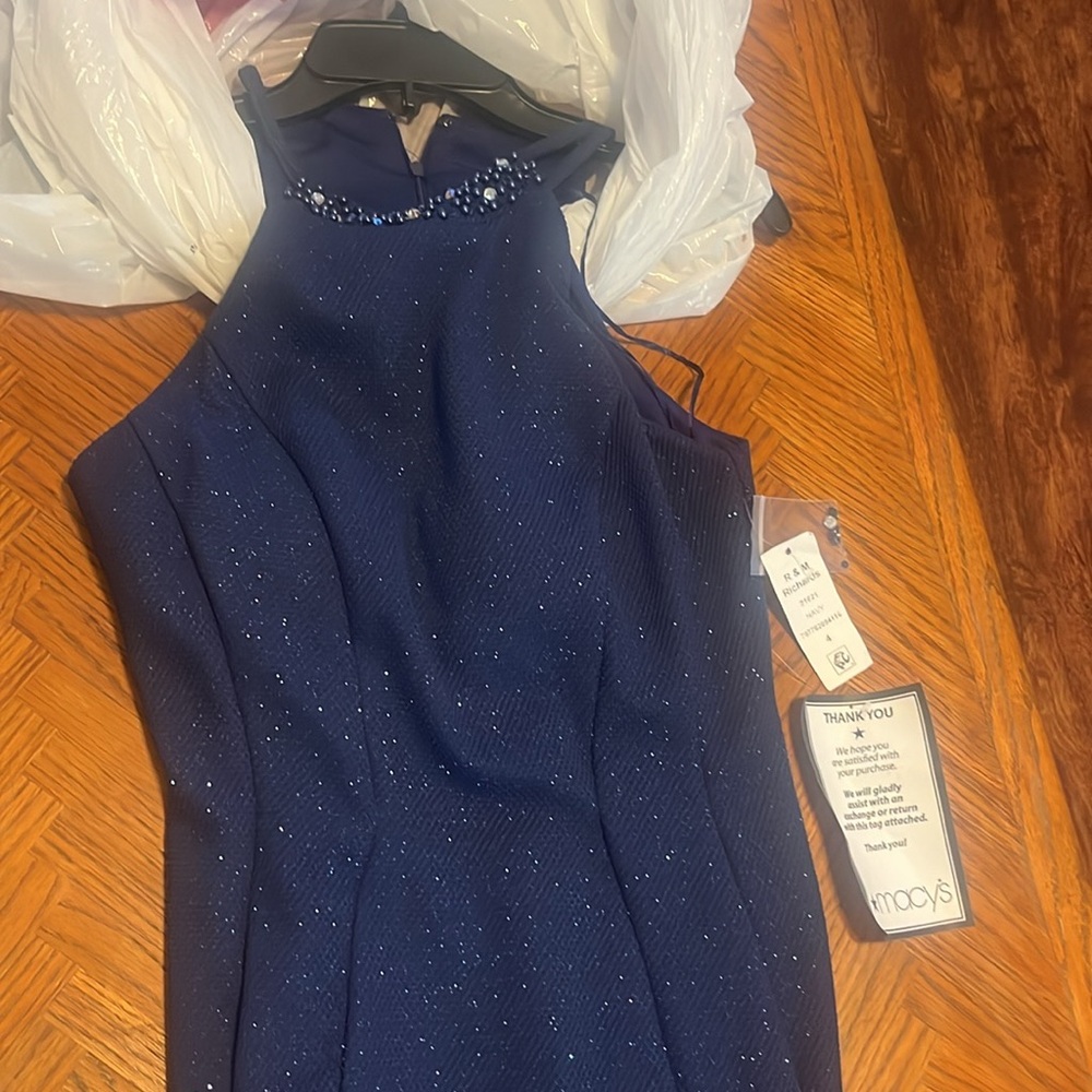 Navy blue maxi formal dress with design on the neck